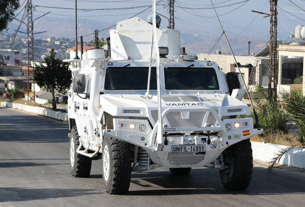 A UN peacekeepers (UNIFIL) vehicle drives in Marjayoun, near the border with Israel, southern Lebanon, on Friday. REUTERS