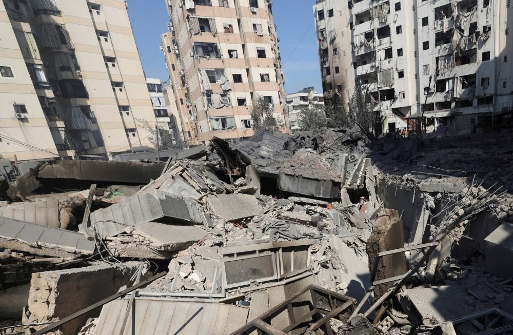 A view shows a damaged site in the aftermath of Israeli strikes on Beirut's southern suburbs, on Friday. REUTERS