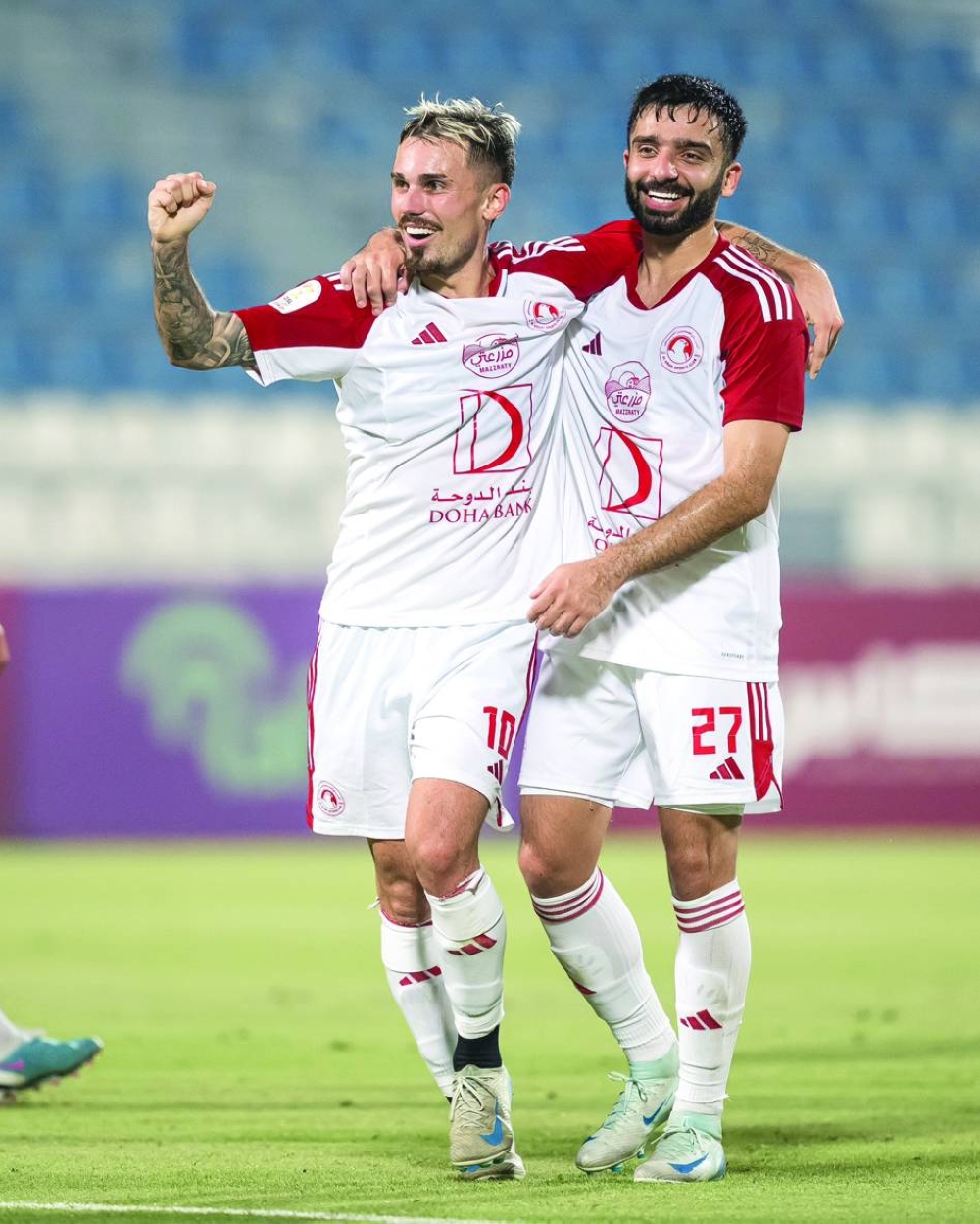 Al Arabi’s Rodrigo Sanchez (left) celebrates after scoring against Al Duhail during the QSL Cup match at the Al Khor Stadium on Friday.