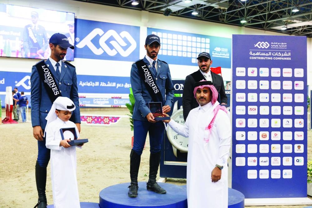 
Longines Hathab Tournament Director Faisal al-Kahla honoured the Open Class winners. 