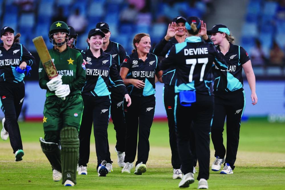 New Zealand team celebrate beating Pakistan in their ICC T20 Women’s World Cup match in Dubai yesterday. (@WHITE_FERNS)