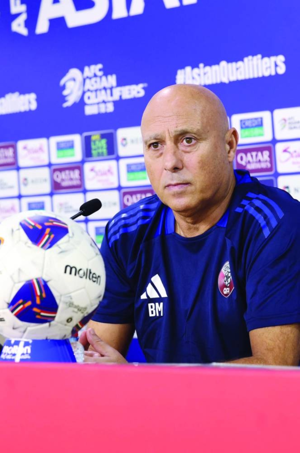 Qatar coach Marquez Lopez addresses the media during a news conference in Dubai yesterday. 