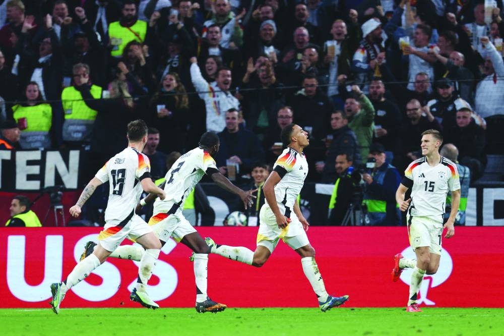 
Germany’s Jamie Leweling (second right) celebrates with teammates after scoring against the Netherlands during the UEFA Nations League match in Munich. (AFP) 
