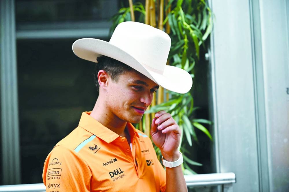 
McLaren’s British driver Lando Norris wears a cowboy hat in the paddock ahead of the United States Formula One Grand Prix at the Circuit of the Americas in Austin, Texas. (AFP) 