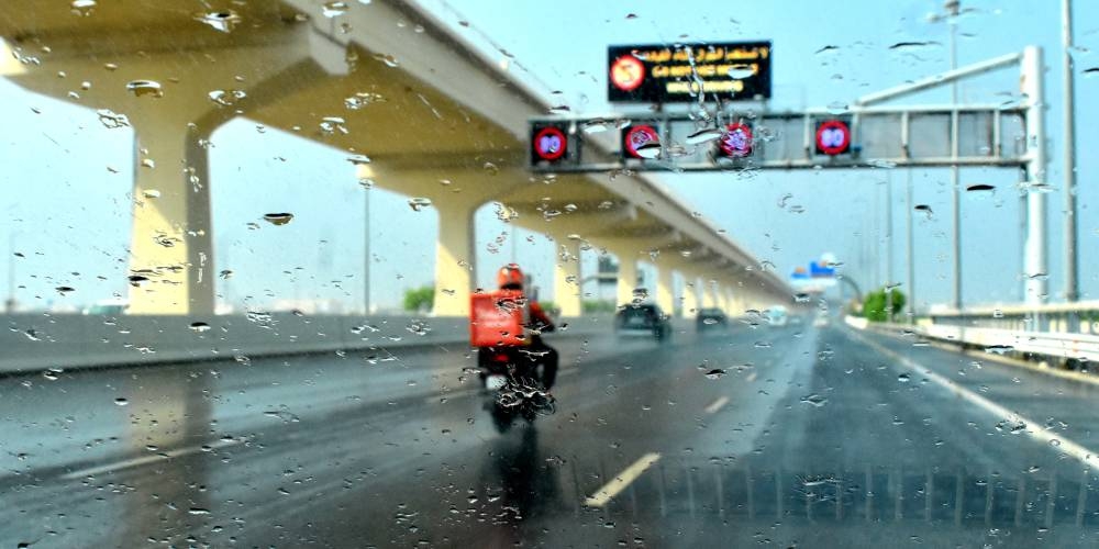 Scenes from Doha roads during the rain Saturday. PICTURE: Thajudheen