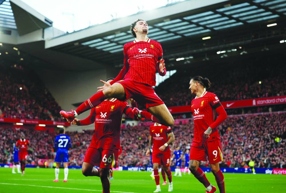 
Liverpool’s Curtis Jones celebrates scoring their second goal against Chelsea at Anfield yesterday. (Reuters) 
