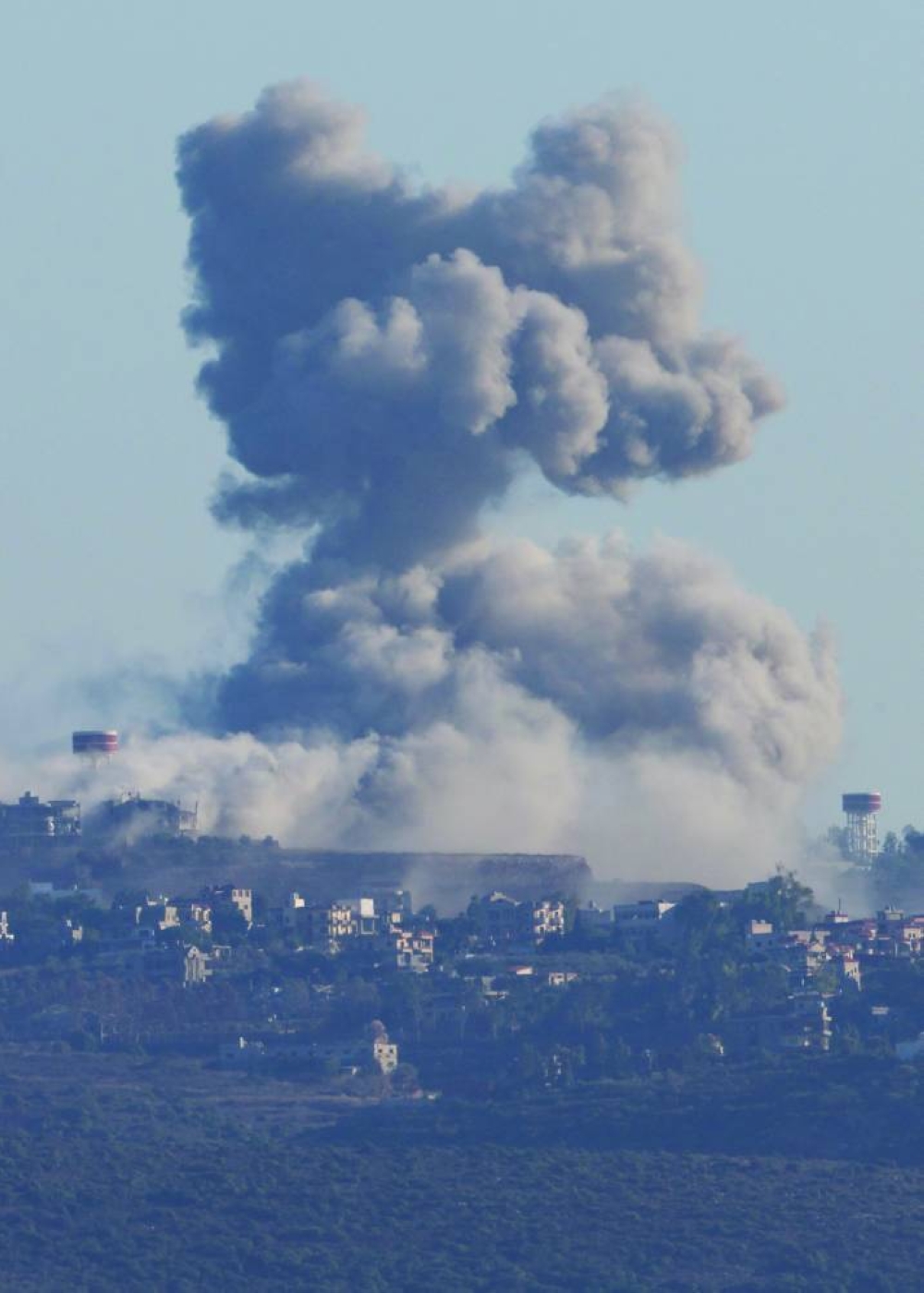 Smoke billows amid the ongoing hostilities between Hezbollah and Israeli forces, as seen from Tyre, southern Lebanon, Monday.