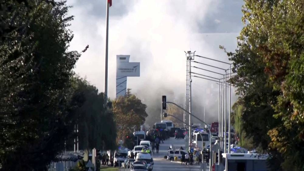 Smoke rises from the headquarters of Turkey's aviation company TUSAS, where three people were killed and five others wounded in an attack, near Kahramankazan on Wednesday. IHA (Ihlas News Agency) via REUTERS