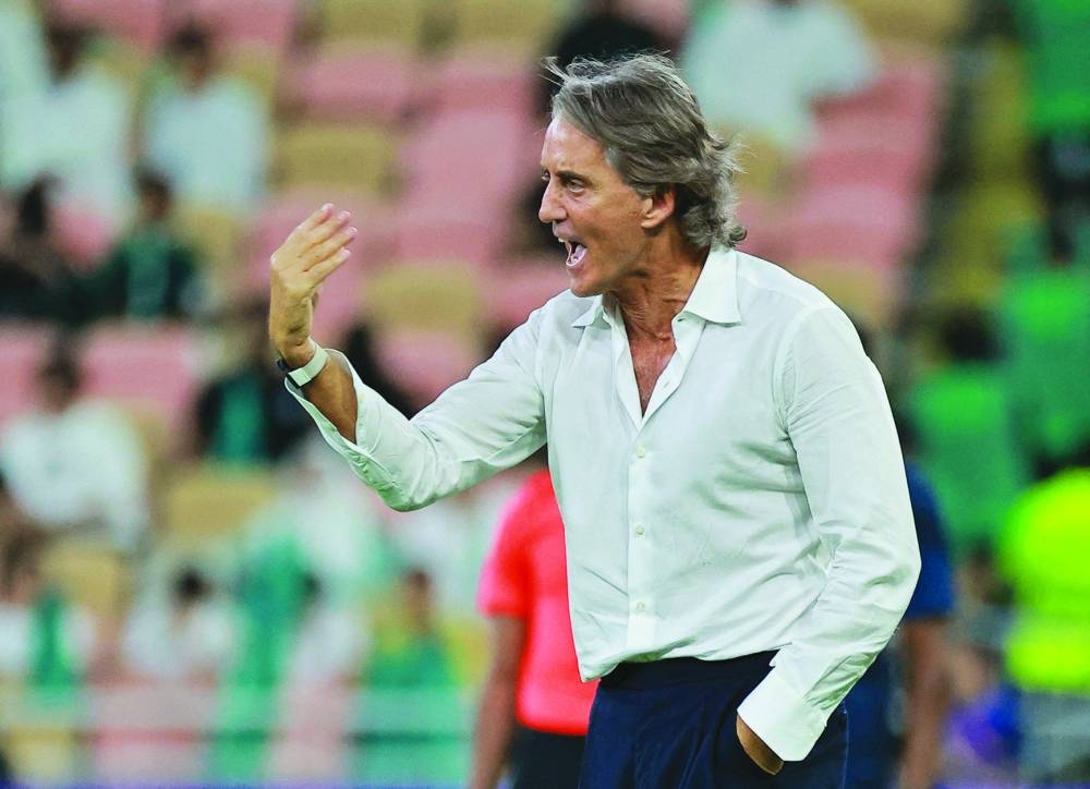 
Roberto Mancini managed seven wins, six defeats and five draws with Saudi Arabia. (Reuters) 