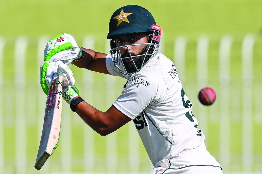 Pakistan’s Saud Shakeel plays a shot during the second day of the third and final Test cricket match between Pakistan and England at the Rawalpindi Cricket Stadium in Rawalpindi on Friday. (AFP)