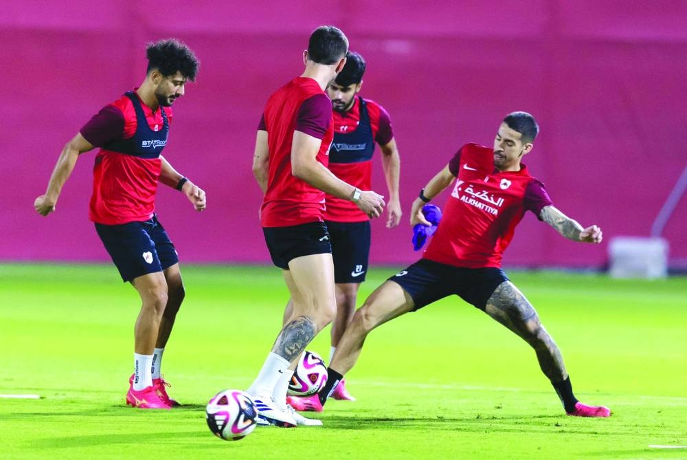 Al Rayyan players train on Friday, on the eve of their match against Al Ahli.