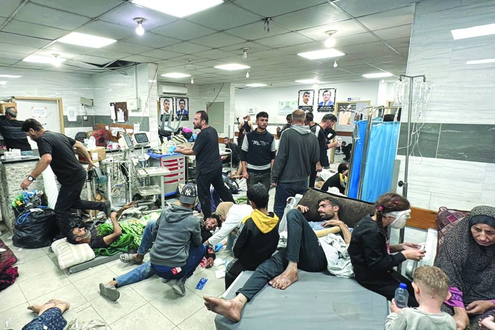 Wounded Palestinians receive treatment at the Kamal Adwan Hospital in Beit Lahia the northern Gaza Strip on Saturday 