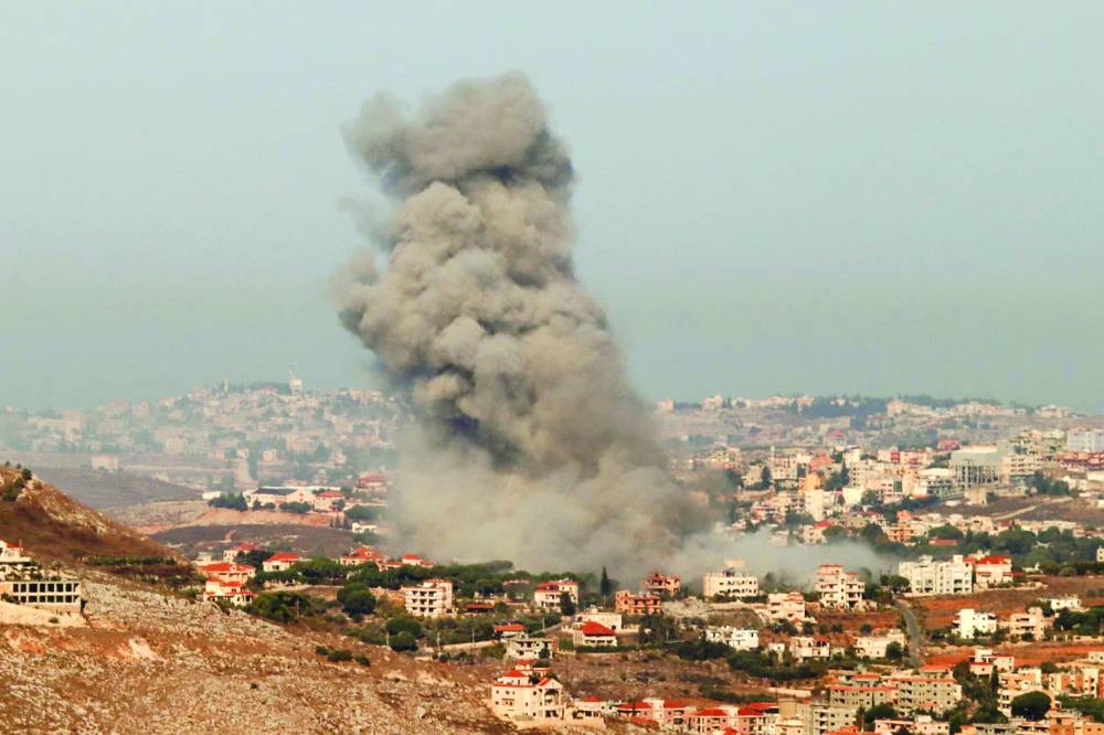 Smoke rises from the site of an Israeli air strike that targeted the southern Lebanese village of Kfar Roummane yesterday, amid the ongoing war between Israel and Hezbollah.