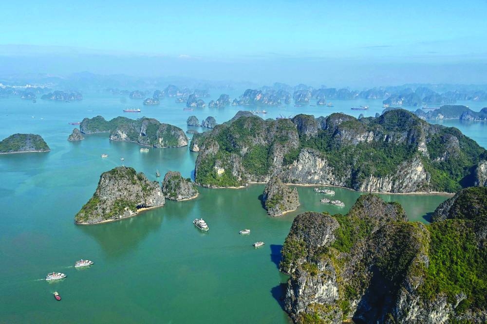 
This aerial photo taken from a seaplane shows tourist boats sailing on the waters of Ha Long Bay in Vietnam’s northeastern province of Quang Ninh. 