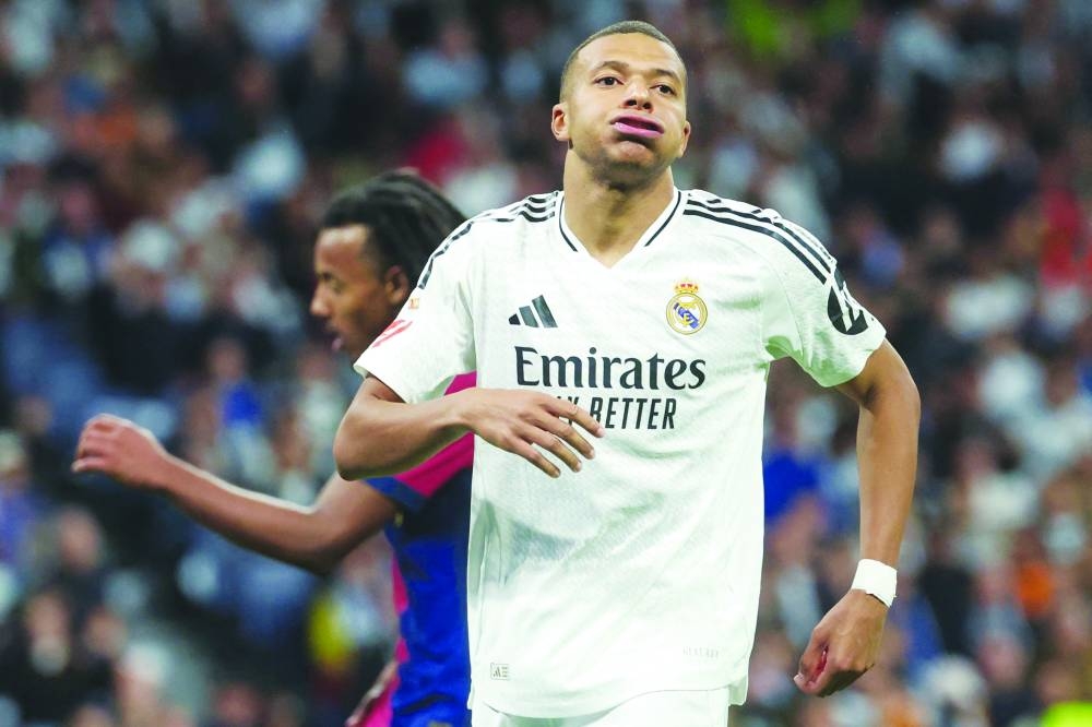 
Real Madrid’s Kylian Mbappe gestures during the La Liga match against Barcelona in Madrid on Saturday. (AFP) 