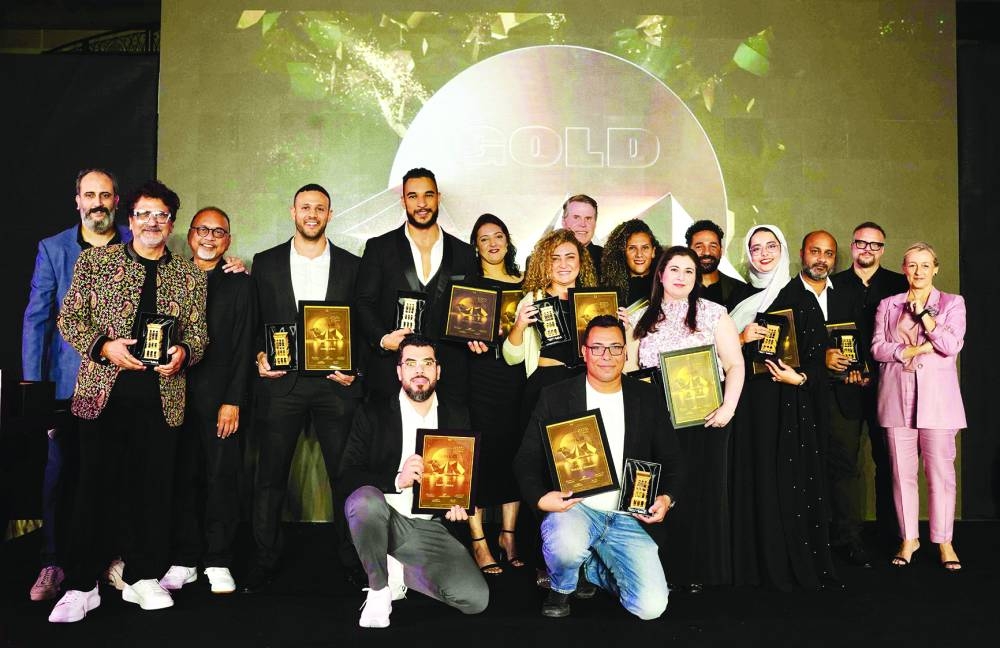 Gold winning team with jury