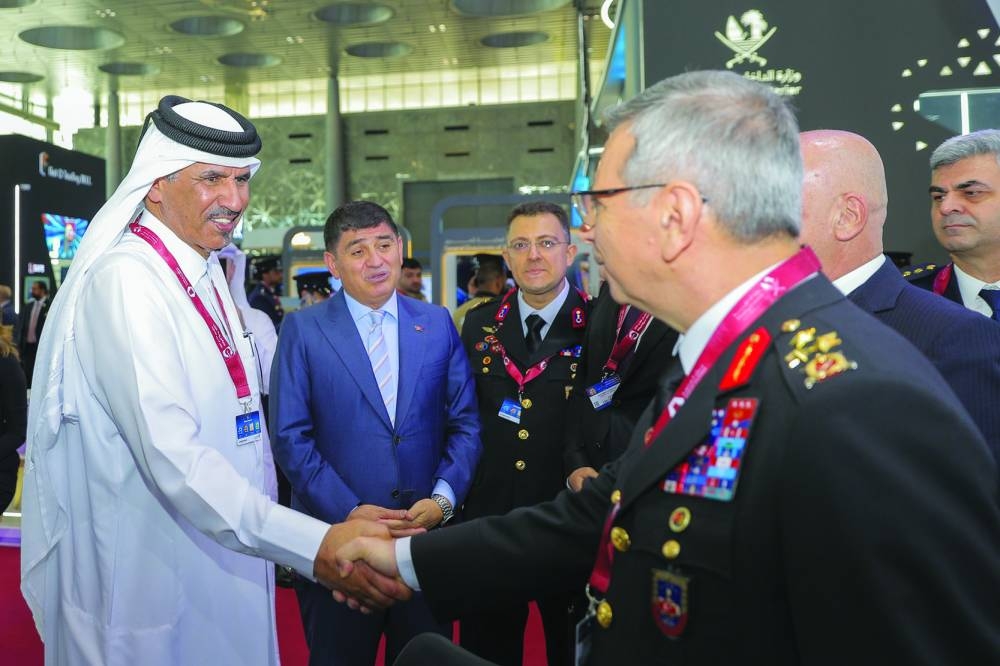 Qatar Chamber first vice chairman Mohamed bin Towar al-Kuwari during a tour of the exhibition area.