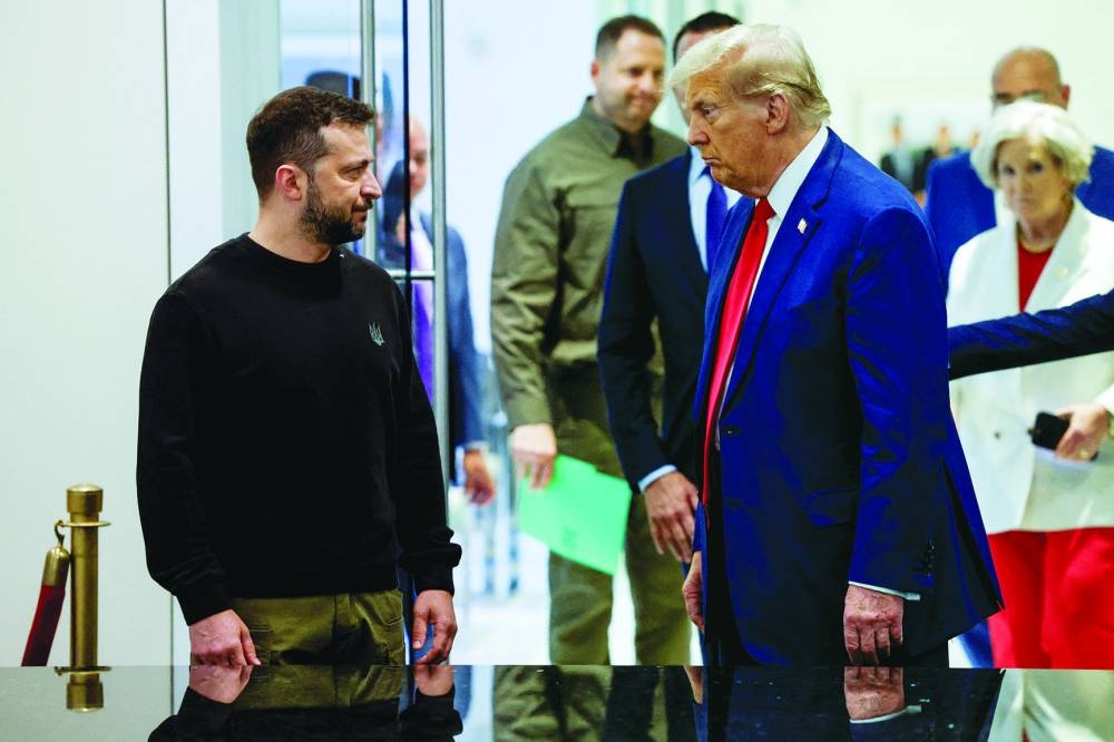 LOOMING SPECTRE: Republican presidential nominee and former US president Donald Trump and Ukraine’s President Volodymyr Zelensky at the Trump Tower in New York City last month. (Reuters)