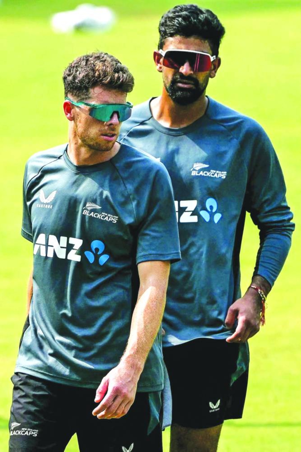 New Zealand's Mitchell Santner (L) and Ish Sodhi attend a practice session on the eve of their third Test cricket match against India, at the Wankhede stadium in Mumbai on October 31, 2024. (Photo by Indranil MUKHERJEE / AFP) / -- IMAGE RESTRICTED TO EDITORIAL USE - STRICTLY NO COMMERCIAL USE --