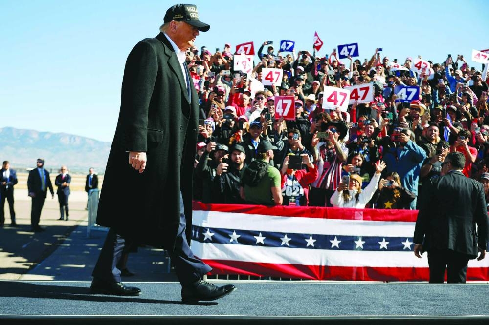 
Donald Trump takes the stage during a campaign rally at Albuquerque International Sunport in New Mexico. 