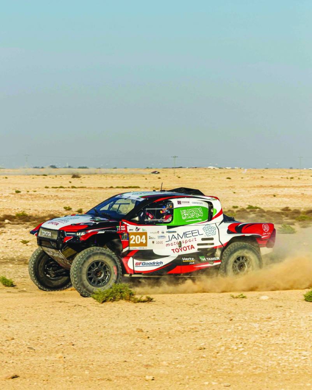 
Saudi Arabia’s driver Dania Akeel and her French navigator Stephane Duple in action during the Qatar International Baja yesterday. 