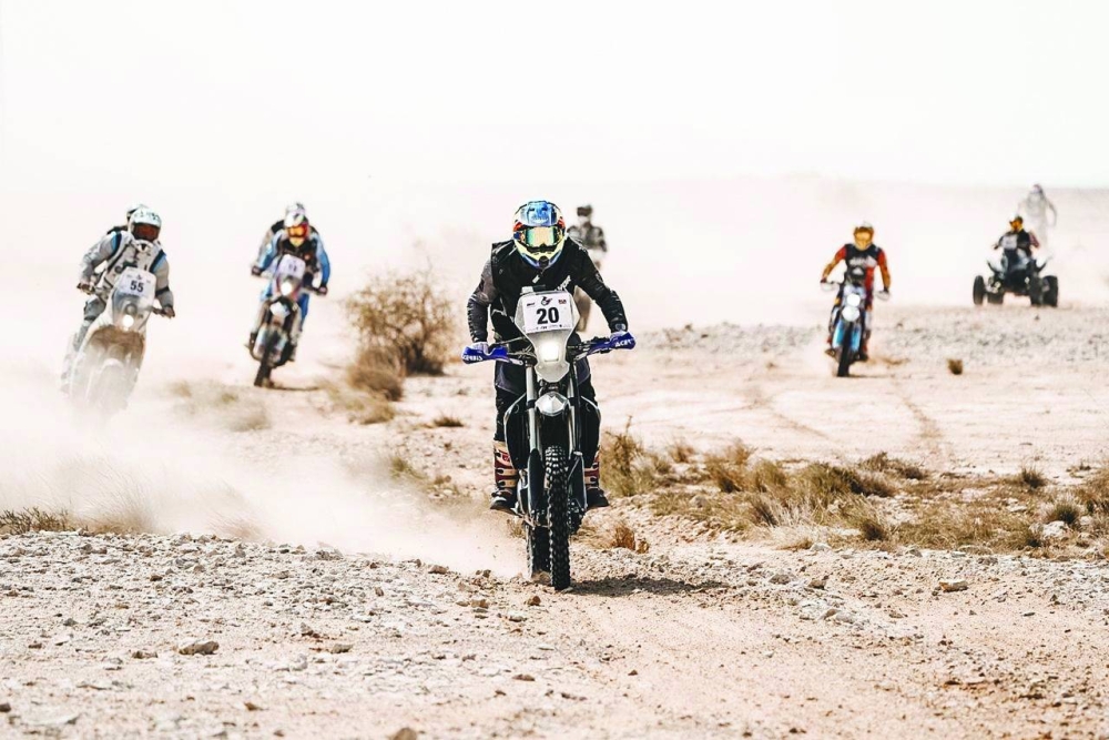 
Riders tackle tricky navigation across the deceptive Qatar desert terrain yesterday. 