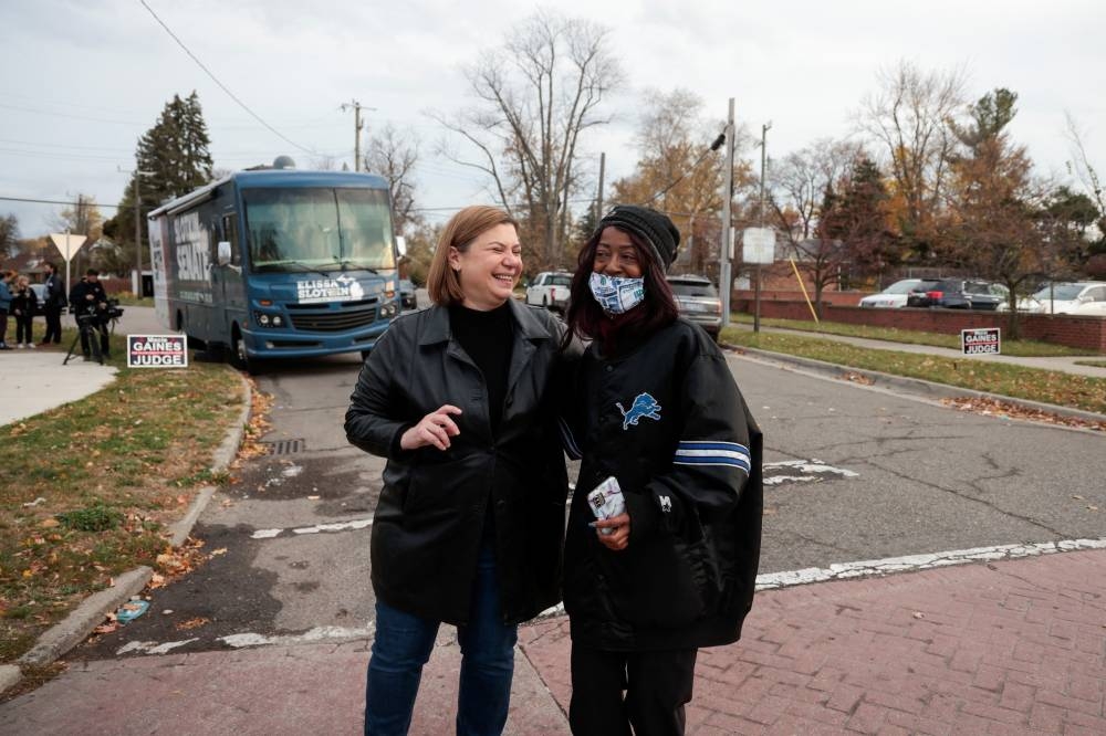 US Representative and a Candidate for United States Senator Elissa Slotkin (D-MI) greets a person near a polling station in the 2024 US presidential election on Election Day in Detroit, Michigan, on Tuesday. REUTERS