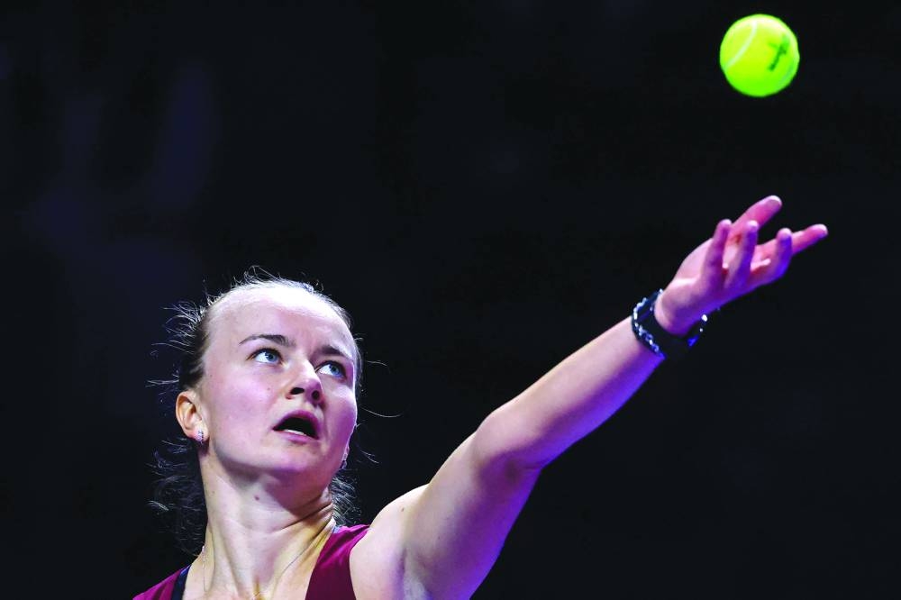 
Barbora Krejcikova serves against Jessica Pegula yesterday. (AFP) 