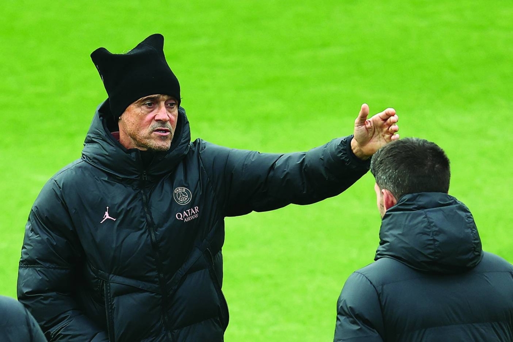 PSG’s coach Luis Enrique gestures during a training session yesterday, on the eve of the Champions League match against Atletico Madrid at the Campus Paris Saint-Germain in Paris yesterday. (AFP)