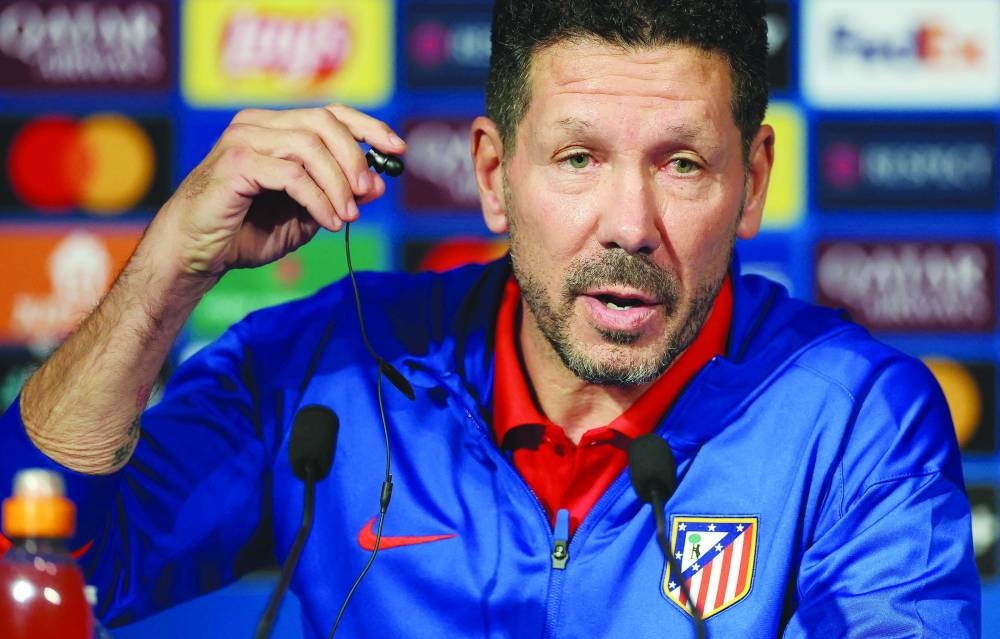 Atletico Madrid's Argentine coach Diego Simeone addresses a press conference on the eve of the UEFA Champions League football match between Paris Saint-Germain and Atletico Madrid at the Parc des Princes stadium in Paris on November 5, 2024. (Photo by FRANCK FIFE / AFP)