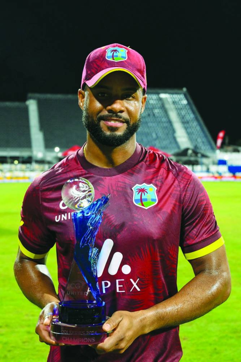 Shai Hope of West Indies poses with the series trophy at Kensington Oval, Bridgetown, Barbados. (AFP)