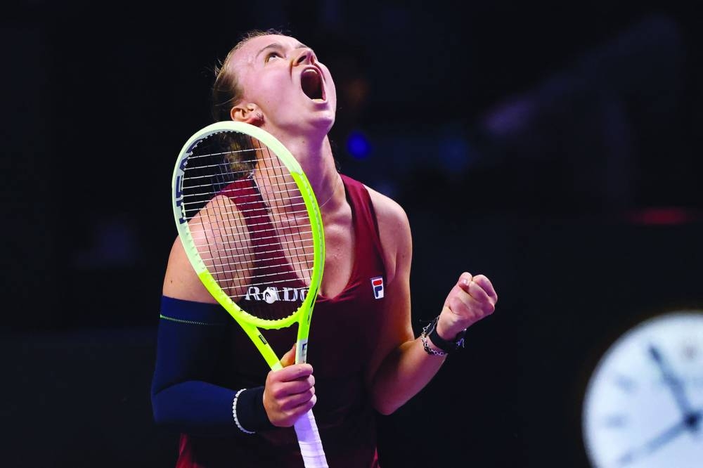 
Czech Republic’s Barbora Krejcikova celebrates after winning against US’ Coco Gauff during their WTA Finals Championship match in Riyadh yesterday. (AFP) 