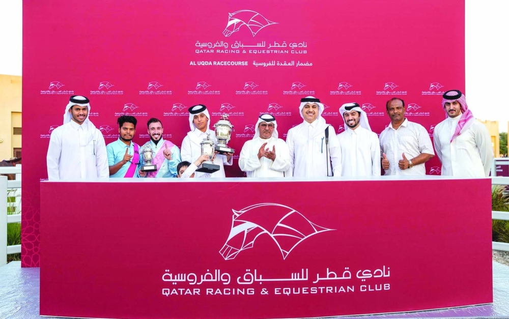 
Connections of Fuwayrit celebrate with the trophy after the seven-year-old won Sealine Cup at the Al Rayyan Racecourse yesterday. PICTURES: Juhaim 