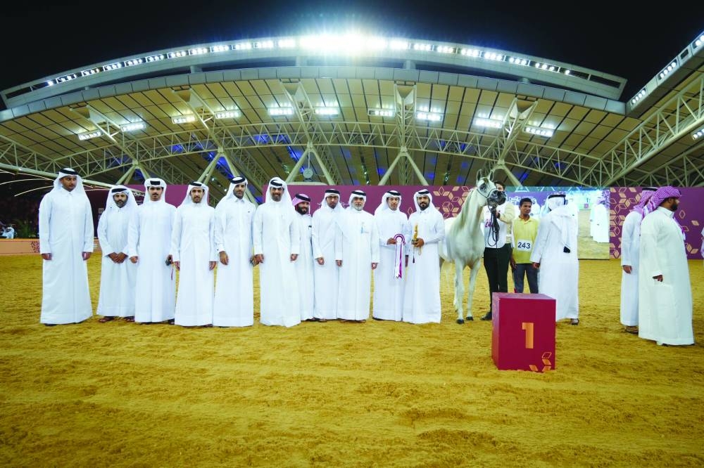 Connections of Qamrat RJ celebrate after the mare won in the ages 4-6 category during the qualifiers for the Al Shaqab International Arabian Horse Beauty Championship yesterday.