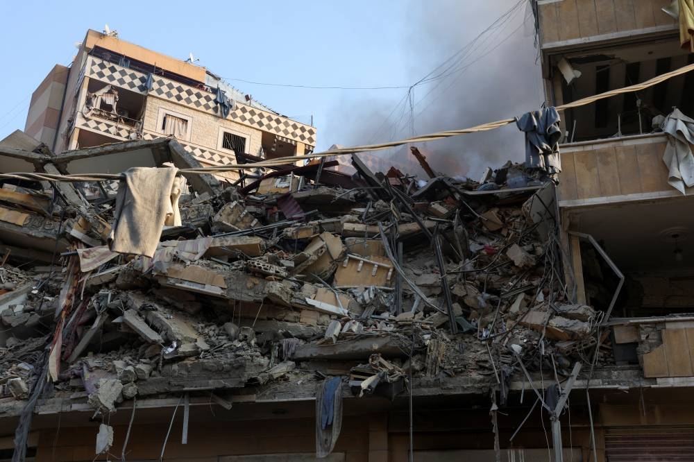 A view shows damaged buildings, in the aftermath of Israeli strikes on Beirut's southern suburbs, during a Hezbollah media tour, on Saturday. REUTERS