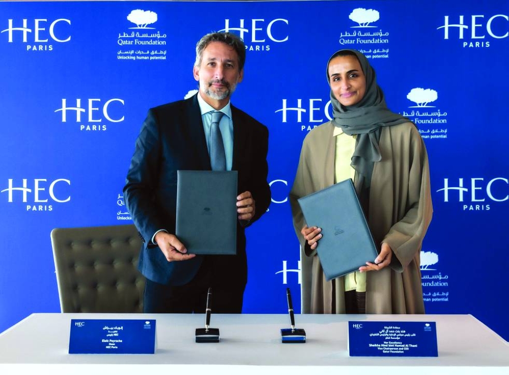 HE Sheikha Hind bint Hamad al-Thani and Dr Eloic Peyrache at the signing ceremony.