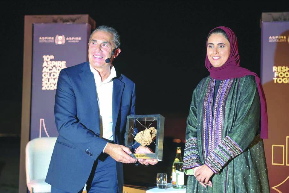 
Director of Marketing and Communications at Aspire Academy Alanoud al-Misnad (right) with Italian basketball coach Sergio Scariolo, who delivered a Star Chat at the summit. 