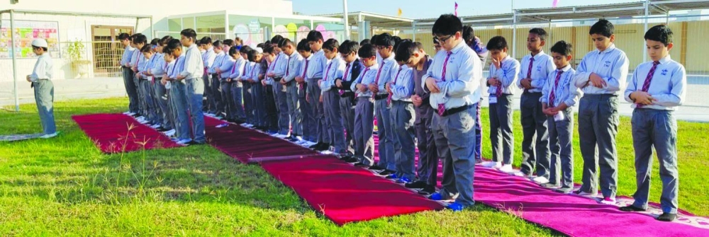 TNG Ain Khalid students in prayer.