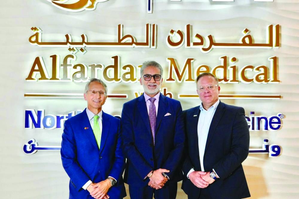 Dr Peter Lechman, (left) and Dr Steven M Baughman with Dr Mohanned al-Makhamreh ( centre), chief operating officer, AMNM.