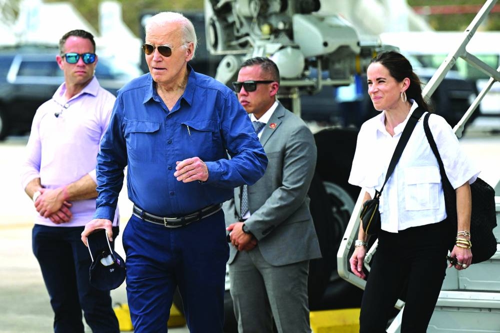 US President Joe Biden and his daughter, Ashley Biden, arrive at Manaus-Eduardo Gomez International Airport in Manaus, Brazil, yesterday. AFP