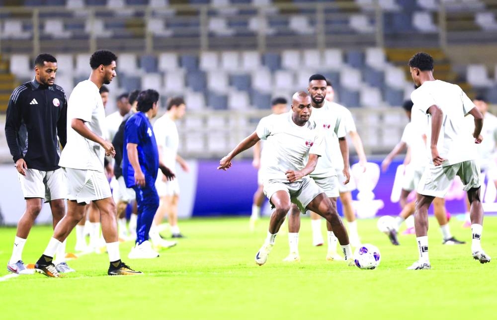 
Qatar coach Marquez Lopez leads a team training session yesterday, on the eve of their 2026 FIFA World Cup qualifying Group A match against United Arab Emirates at Al Nahyan Stadium in Abu Dhabi.  