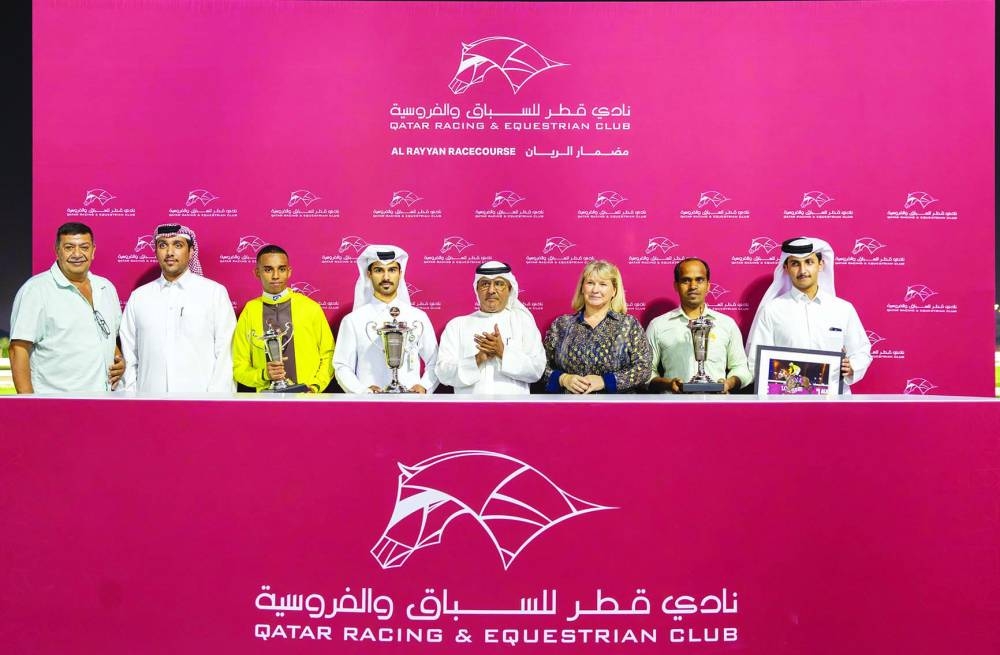 
Connections of Lemon Ginger celebrate after the four-year-old bay gelding won the Al Thakira Cup at the Al Rayyan Racecourse. PICTURES: Juhaim 