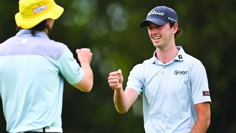 Elvis Smylie fist bumps on day one of the Australian PGA Championship at Royal Queensland Golf Club on Thursday. (pga.org.au)