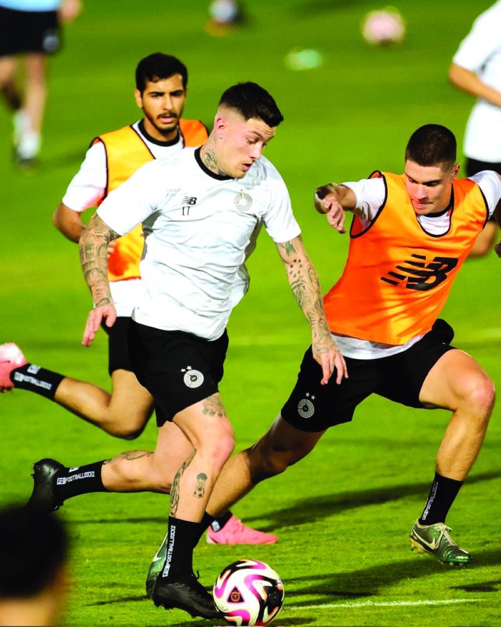 
Al Sadd players at a training session on the eve of their Qatar Stars League match. 