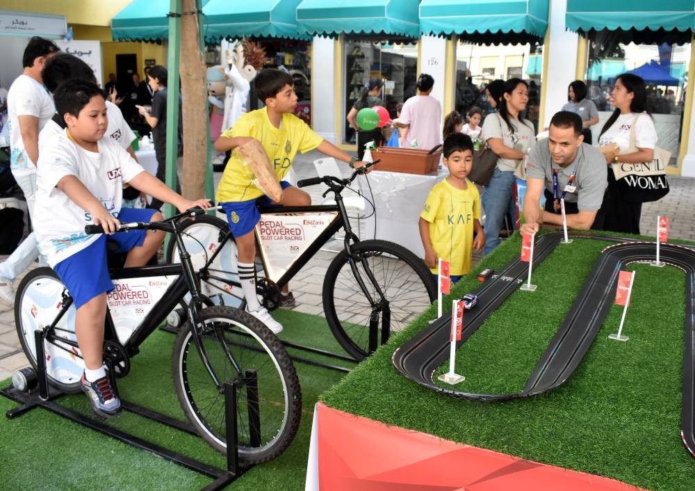 Children enjoying some of the event's side activities. PICTURE: Thajudheen