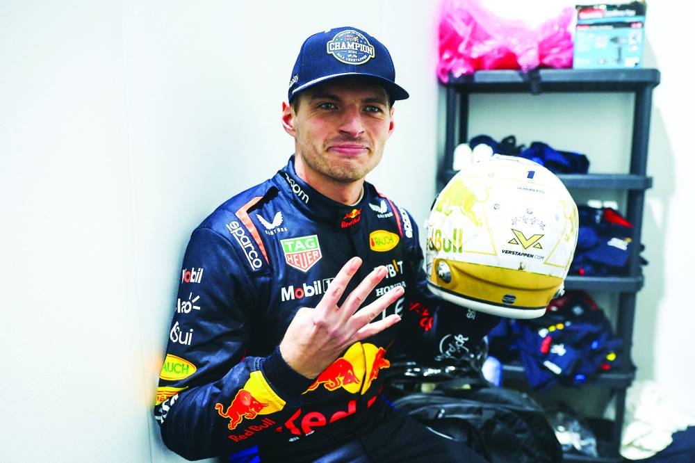 F1 World Drivers Champion Max Verstappen of the Netherlands and Oracle Red Bull Racing celebrates after the F1 Grand Prix of Las Vegas at Las Vegas Strip Circuit on November 23, 2024 in Las Vegas, Nevada.  (Getty Images via AFP)