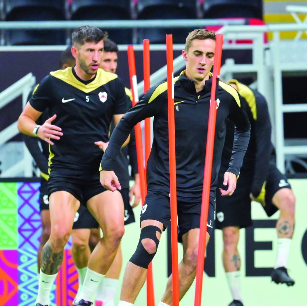 Al Rayyan players in action during a training session on Sunday.