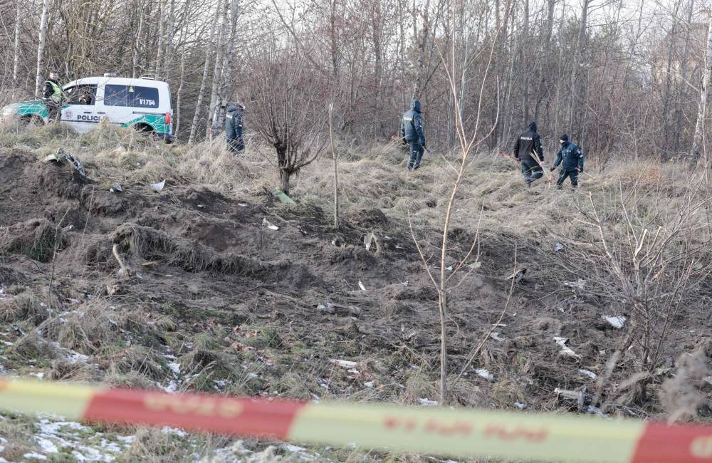 Lithuanian police search the area where a DHL cargo plane crashed near the Vilnius International Airport in Vilnius, on Monday. AFP