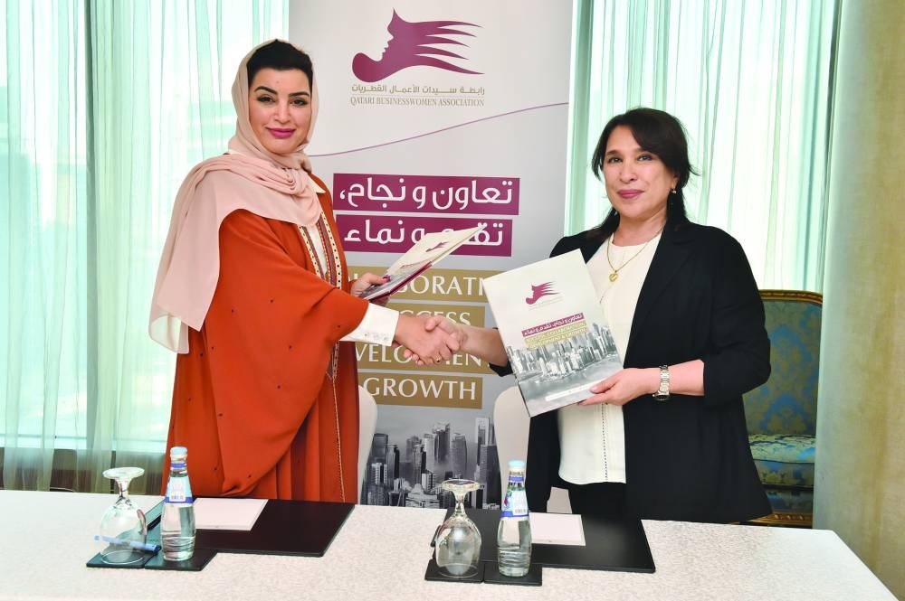 Aisha Alfardan, vice-chairwoman of QBWA, and Oydin Sharafiddinova, chairwoman of the Surkhandarya region, after signing the MoU on Tuesday.