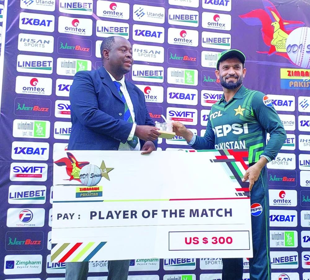 Pakistan’s Kamran Ghulam receives the Player of the Match award on Thursday.